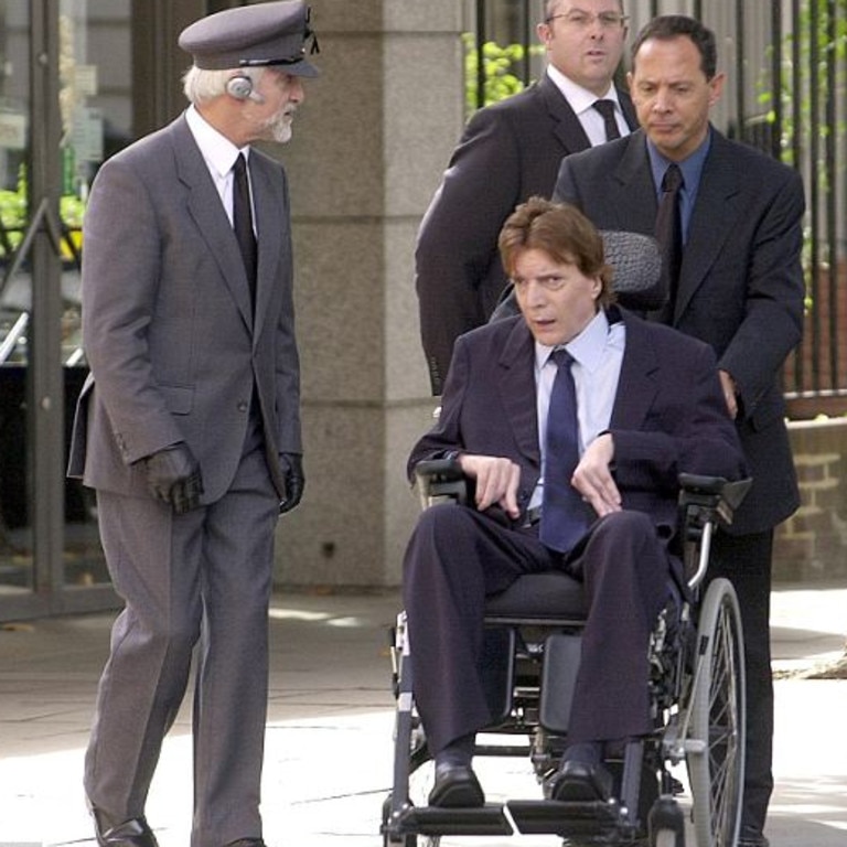 John Paul Getty III and his chauffeur leave the memorial mass held for his father Sir John Paul Getty in London, who died of a chest infection in April 2003 at age 70.