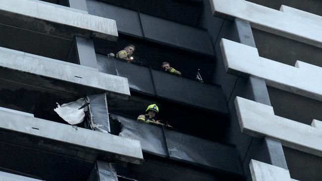 Fire crews at an apartment tower fire in Spencer St in February. Picture: Andrew Henshaw