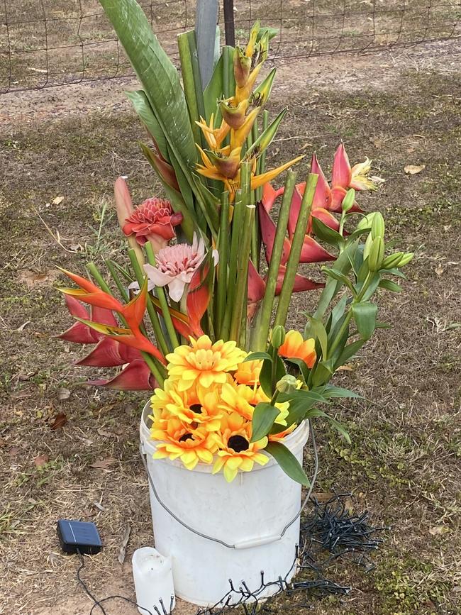 Roadside tributes left near the scene of the fatal crash. Picture: Natasha Emeck