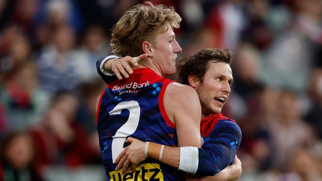 MELBOURNE, AUSTRALIA - MAY 26: Jacob van Rooyen (left) and Ed Langdon of the Demons celebrate during the 2024 AFL Round 11 match between Narrm (Melbourne) and Euro-Yroke (St Kilda) at The Melbourne Cricket Ground on May 26, 2024 in Melbourne, Australia. (Photo by Michael Willson/AFL Photos via Getty Images)