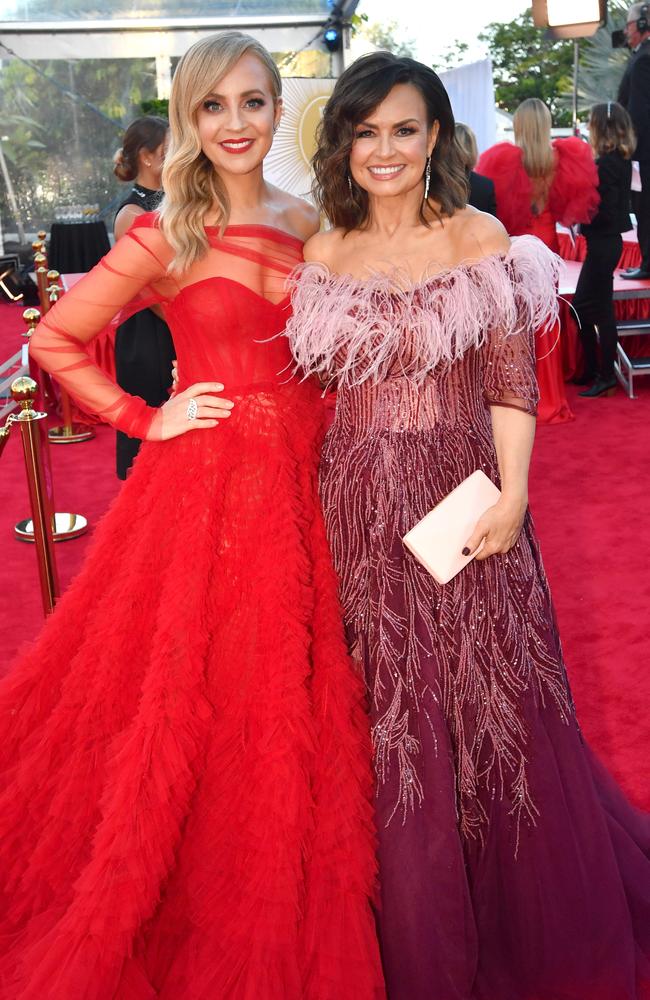 Carrie Bickmore and Lisa Wilkinson at the 2019 Logie Awards. They are both leaving The Project. Picture: AAP Image/Darren England.