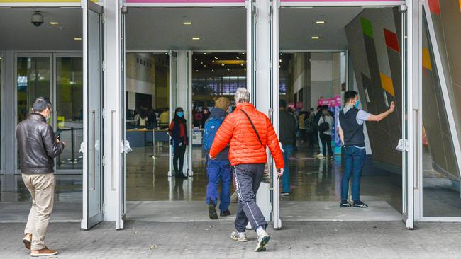 People entering the Wayville COVID-19 vaccination hub. Picture: Brenton Edwards