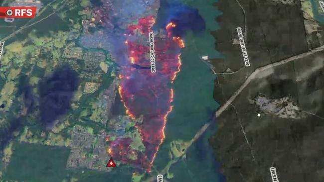 Three separate scrub fires at Abermain joined on Thursday evening, creating an emergency situation. Picture: NSW RFS