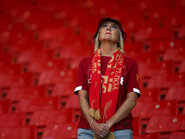 A Liverpool supporter looks from the stands and wonders what could have been. Picture: AP Photo/Dave Thompson