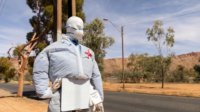 A dummy dressed as a health worker on Bradshaw Drive, Alice Springs. Photo: EMMA MURRAY