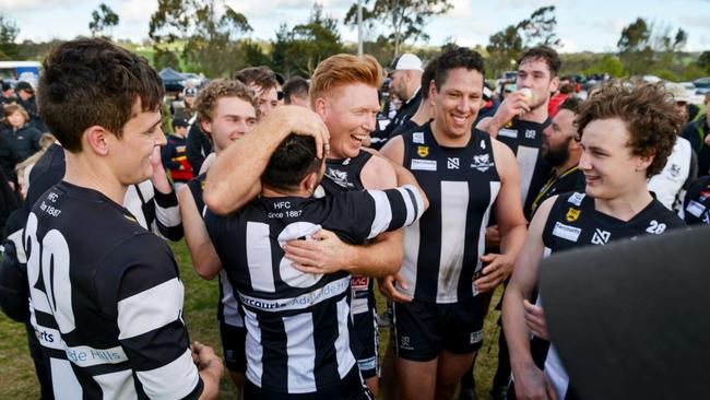 Hahndorf players celebrate their grand final win. Picture: AAP/Brenton Edwards