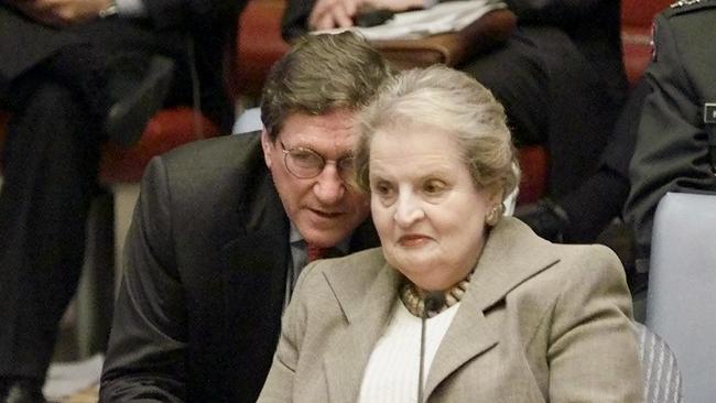 US Representative to the United Nations Richard Holbrooke (L) conferring with US Secretary of State Madeleine Albright (R) during a UN Security Council meeting on Small Arms at UN headquarters in New York in 1999.