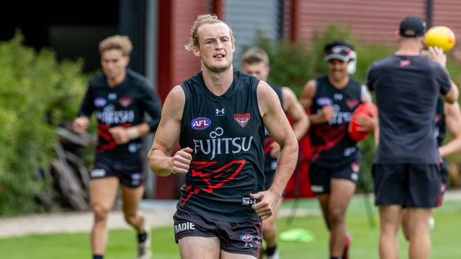 Essendon defender Mason Redman on the training track ahead of the 2024 season. Picture: Jake Nowakowski