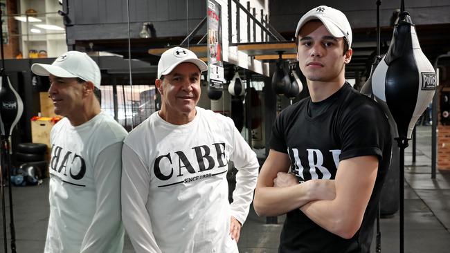 Boxer Brock Jarvis pictured with trainer Jeff Fenech. Picture: Toby Zerna