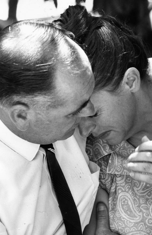 ANGUISH: Jim Beaumont comforts his distressed wife, Nancy, during a press conference just days after their children disappeared on Australia Day, 1966.