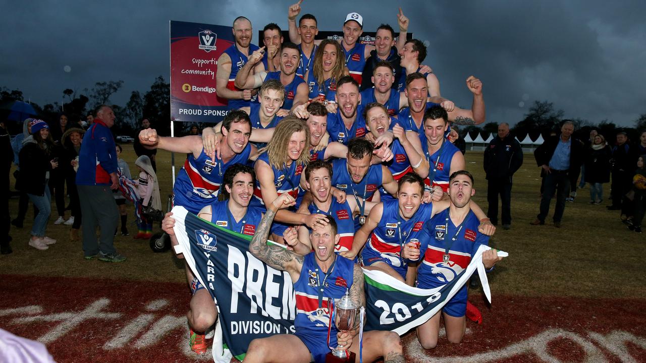 Wandin players celebrate their win in the AFL Yarra Football Grand Final between Wandin and Woori played at Yarra Glen Showgrounds on Friday 28th September, 2018.