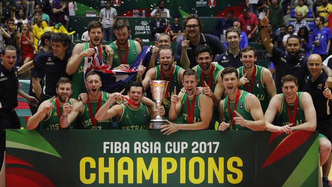 The Boomers celebrate with the championship trophy following their 79-56 win against Iran in the final of the FIBA Asia Basketball Cup in Lebanon.