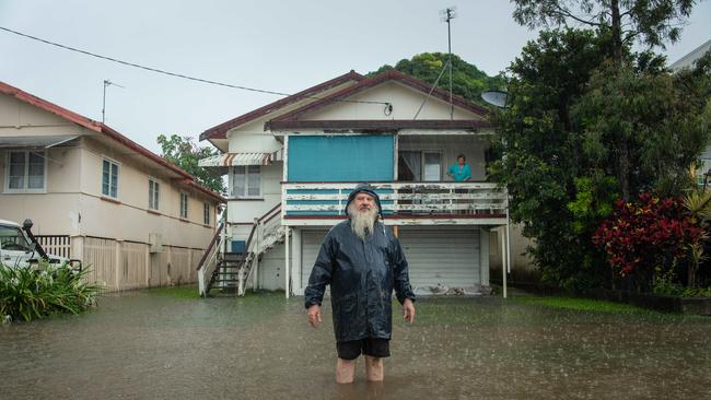 Bradman Ave residents Alan and Sheryl Johnson have sandbagged their property as the Maroochy River rises. Picture: Brad Fleet