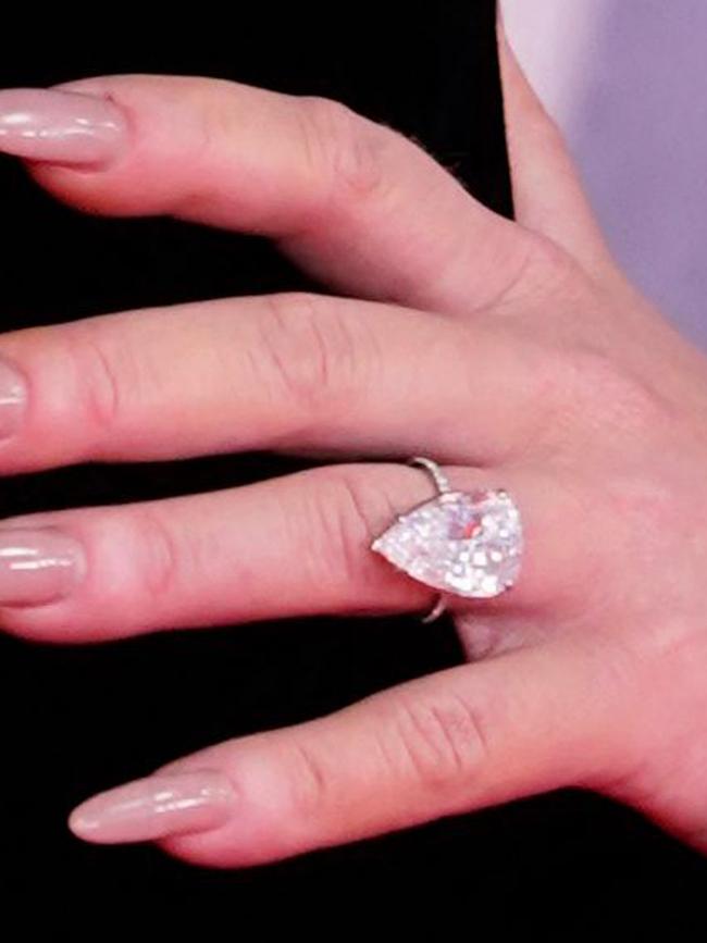 The singer was wearing a ring that looked an awful lot like an engagement sparkler. Picture: Niklas Halle'n/AFP