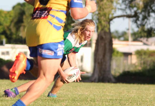 GOOD PICK UP: Mitch Whitton scrambles to control the ball against Souths Sharks. Picture: Peter Carruthers