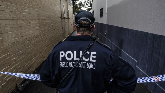 Police remain at the scene in Surry Hills, almost a week after the initial counter-terror raids. Picture: Getty Images