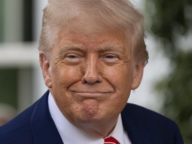 President Donald Trump speaks with reporters in front of the West Wing of the White House, Thursday, May 8, 2025, in Washington. (AP Photo/Alex Brandon)