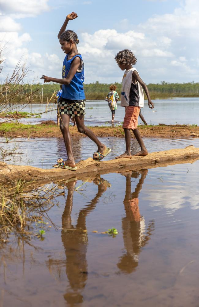 Gapuwiyak children play by Lake Evella, which sits on the edge of the community, in northeast Arnhem Land.