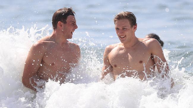 Australia’s golden boys cool of at Copacabana beach. Picture: Alex Coppel.