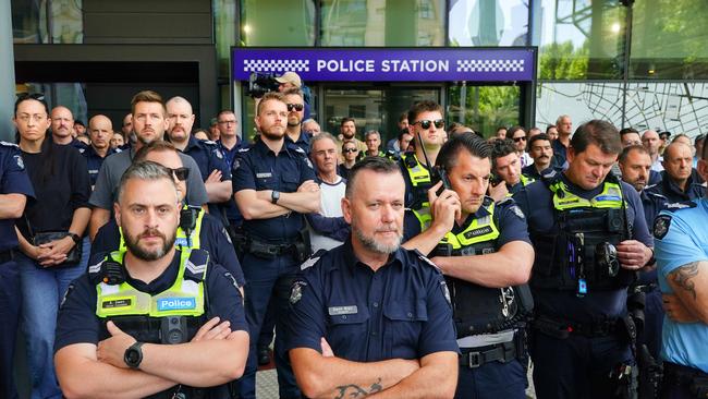 Police gather outside Spencer st HQ at 11 during industrial dispute. Picture: NewsWire / Luis Enrique Ascui