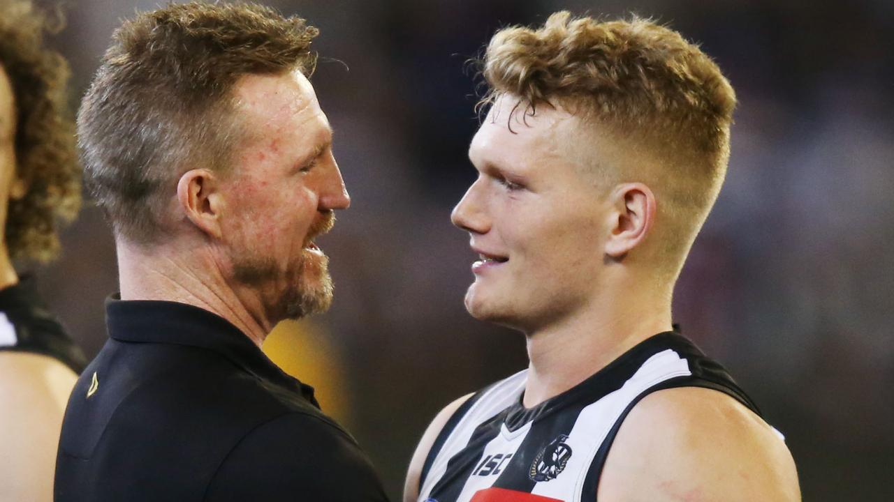 MELBOURNE, AUSTRALIA - JUNE 10: Magpies head coach Nathan Buckley hugs Adam Treloar of the Magpies after the win during the AFL Round 12 match between Collingwood v Melbourne at Melbourne Cricket Ground on June 10, 2019 in Melbourne, Australia. (Photo by Michael Dodge/AFL Photos/Getty Images)