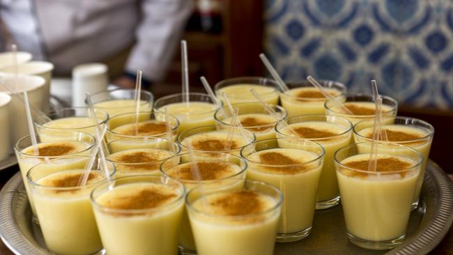 Turkish traditional historical sweet drink boza served in cups with cinamon in Istanbul.