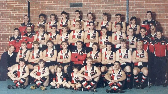 Mackenzie (second row, fourth right) had a stint in St Kilda’s under-19 side, where he played alongside Shane Warne (second row, far right). Photo: St Kilda FC