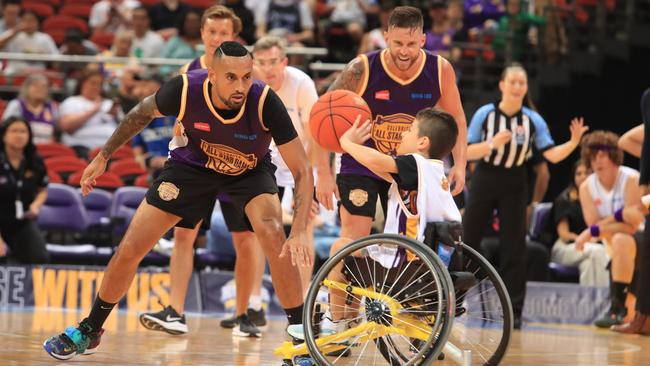 Kyrgios gets a youngster involved in the Charity Game.