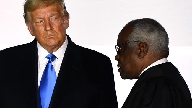 Then US President Donald Trump with Clarence Thomas. Picture: AFP.