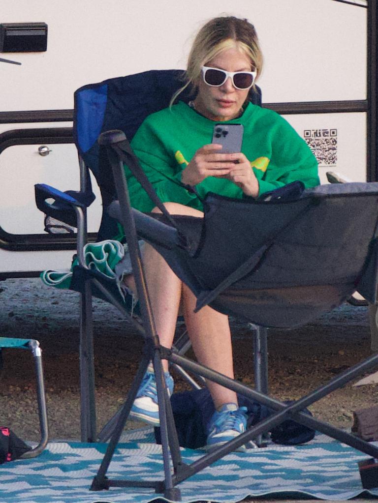 Spelling could be seen sitting in a camp chair outside her RV. Picture: SplashNews.com