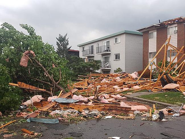 Destroyed buildings and cars are seen in Mont-Bleu, Gatineau, Quebec, close to Ottawa. Picture: Vincent-Carl Leriche/AFP