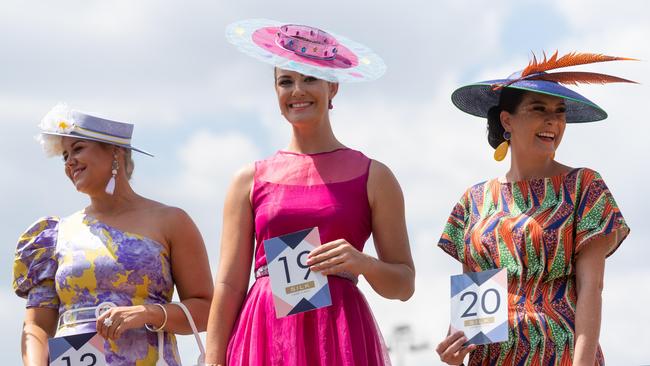 Hannah West (centre) was named the Darwin Cup Carnival’s 2021 ambassador. Picture: Che Chorley