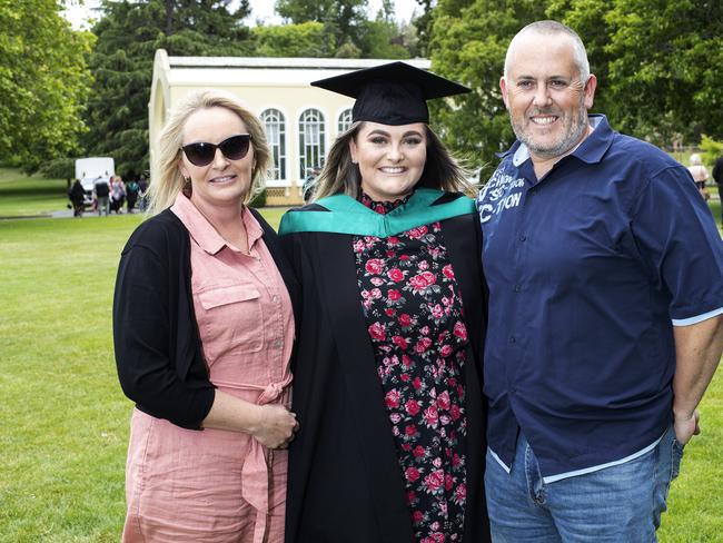 Bronwyn McKenna, Kelsy Bellchambers and Adrian Bellchambers at the UTAS Graduation at Launceston. PICTURE CHRIS KIDD