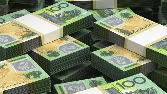 Stack of Australian Dollars. Australian money. $100 bill stacks. Thinkstock