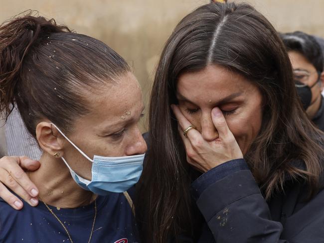 Spain's Queen Letizia reacts as she comforts a woman affected by the floods in Paiporta, near Valencia, Spain. Picture: EFE via AP