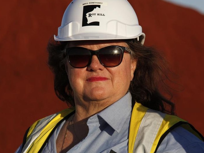 Billionaire Gina Rinehart, chairman of Hancock Prospecting Pty, stands for a photograph during a tour of the company's Roy Hill Mine operations under construction in the Pilbara region, Western Australia, on Thursday, Nov. 20, 2014. Rinehart, the Asia-Pacific's richest woman, is set to start exports in September from her new A$10 billion ($8.6 billion) iron ore mine undeterred by prices trading near five-year lows and forecast to extend losses. Photographer: Philip Gostelow/Bloomberg *** Local Caption *** Gina Rinehart