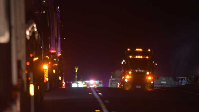 A cattle truck has rolled and caught fire on the Warrego Highway at Muckadilla. Picture: Jorja McDonnell