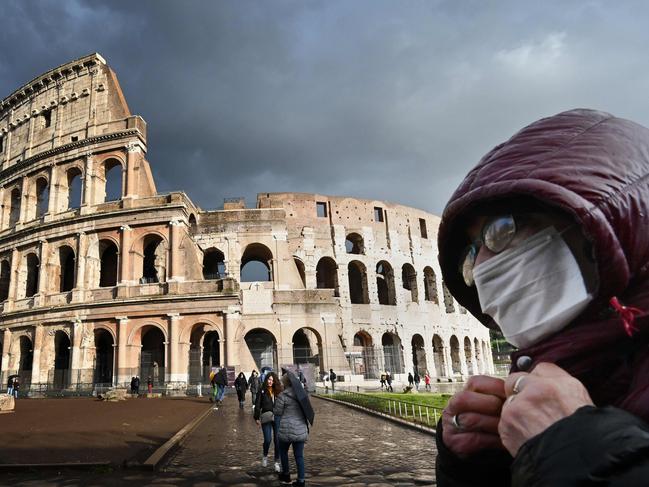 A man walks by the Coliseum in Rome as WHO warns Europe to not lapse. Picture: AFP