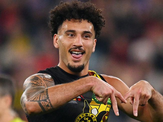 MELBOURNE, AUSTRALIA - MAY 25: Mykelti Lefau of the Tigers celebrates a goal during the round 11 AFL match between Richmond Tigers and Essendon Bombers at Melbourne Cricket Ground, on May 25, 2024, in Melbourne, Australia. (Photo by Morgan Hancock/AFL Photos/via Getty Images)