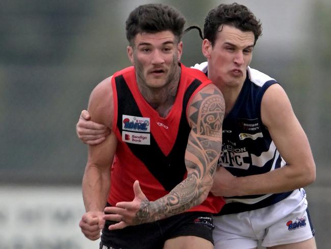 Western RamsÃ Brandon Watts and MacedonÃs  Zachary Smedley during the RDFL Western Rams v Macedon football match in Rockbank, Saturday, June 3, 2023. Picture: Andy Brownbill