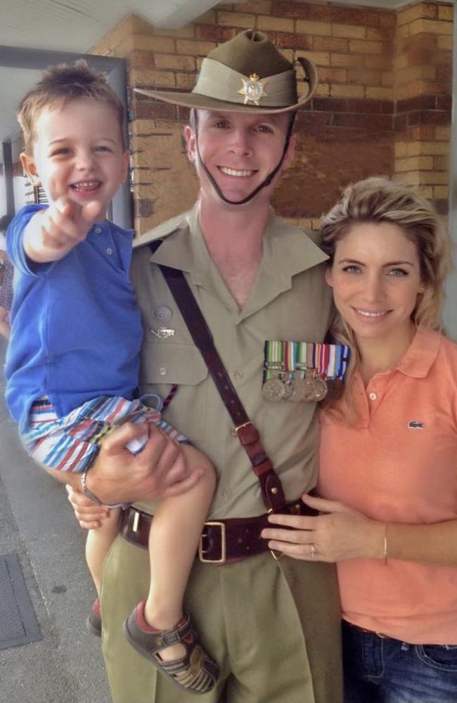 Brett Green with his wife Amber, and son Elijah.