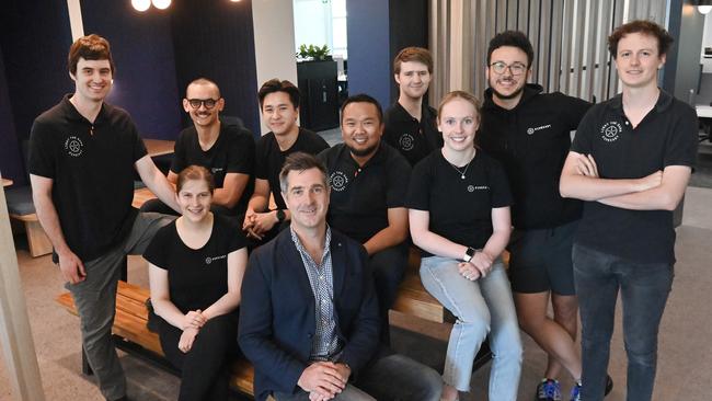 Dr Brenton Cooper with a new crop of graduates. Picture: Keryn Stevens