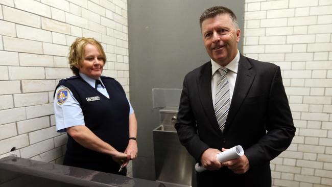 Yarnton gave former police minister Michael Gallacher a tour of holding cells at Central Local Court in 2013.