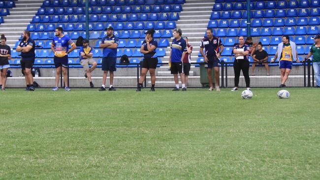 LINING UP: At the Gold Coast Titans special coaching clinic, coaches from clubs all over the region took advantage of learning from the experts at Crozier Field on Thursday night. Photo: Alison Paterson