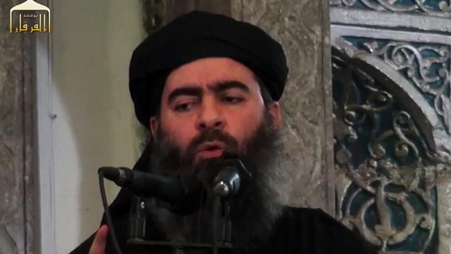 (FILES) In this file image grab taken from a propaganda video released on July 05, 2014 by al-Furqan Media allegedly shows the leader of the Islamic State (IS) jihadist group, Abu Bakr al-Baghdadi, aka Caliph Ibrahim, addressing Muslim worshippers at a mosque in the militant-held northern Iraqi city of Mosul.  / AFP PHOTO / AL-FURQAN MEDIA / -