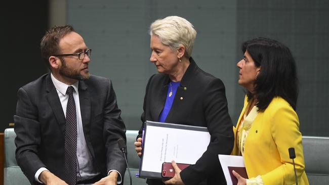 Greens MP Adam Bandt, left, and Independent MPs Kerryn Phelps and Julia Banks react after a division on suspension of standing orders today. Picture: AAP