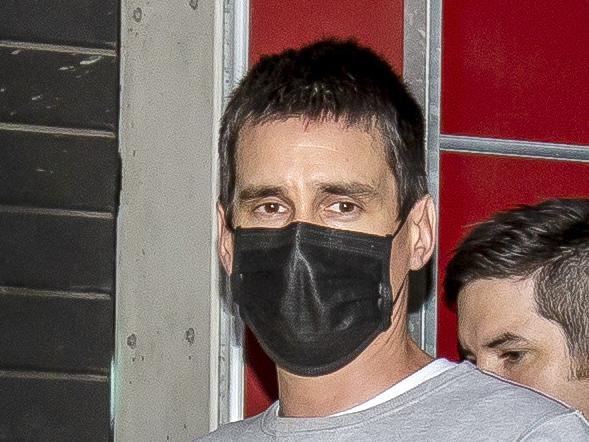 Melbourne Crash Porsche driver Richard Pusey is taken from his home by police. Picture: Tim Carrafa