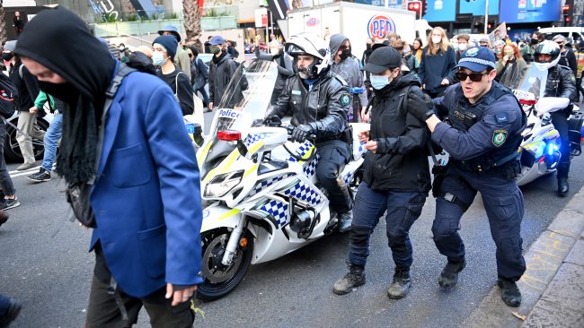 NSW Police officers attempted to stop the protesters. They were stationed at key points around the city in anticipation. Picture: NCA NewsWire / Jeremy Piper