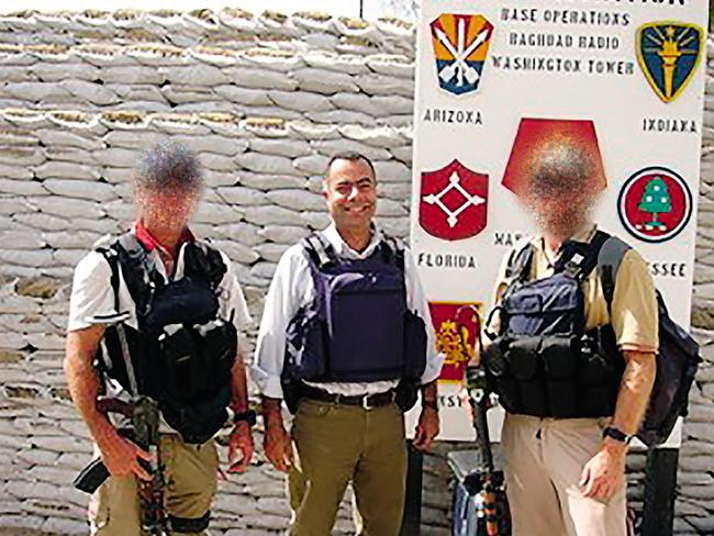 ‘Are we ever going to win this thing?’ … Nick Kaldas with two members of his protection team (faces pixelated to protect their identities) in Iraq around 2004. Courtesy of Nick Kaldas.