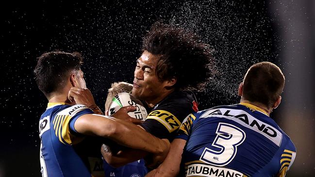 SYDNEY, AUSTRALIA - JULY 02:  Brian To'o of the Panthers is tackled during the round 16 NRL match between the Penrith Panthers and the Parramatta Eels at BlueBet Stadium on July 02, 2021, in Sydney, Australia. (Photo by Mark Kolbe/Getty Images)